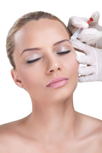 Soft-Tissue Fillers - female face at injection