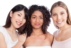 Smiling females - treating Acne