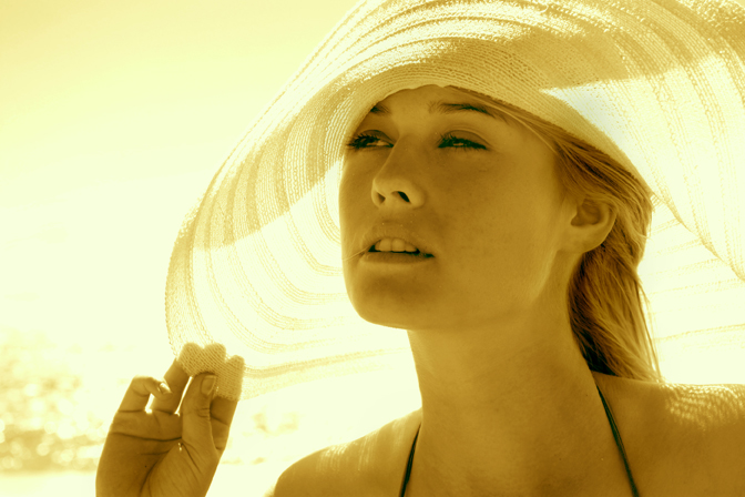 Woman on beach at sombrero