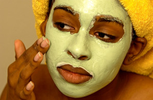 Female face with cosmetic facial mask
