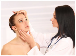 Doctor examining patient mole on face