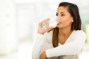 Girl drinking water photo