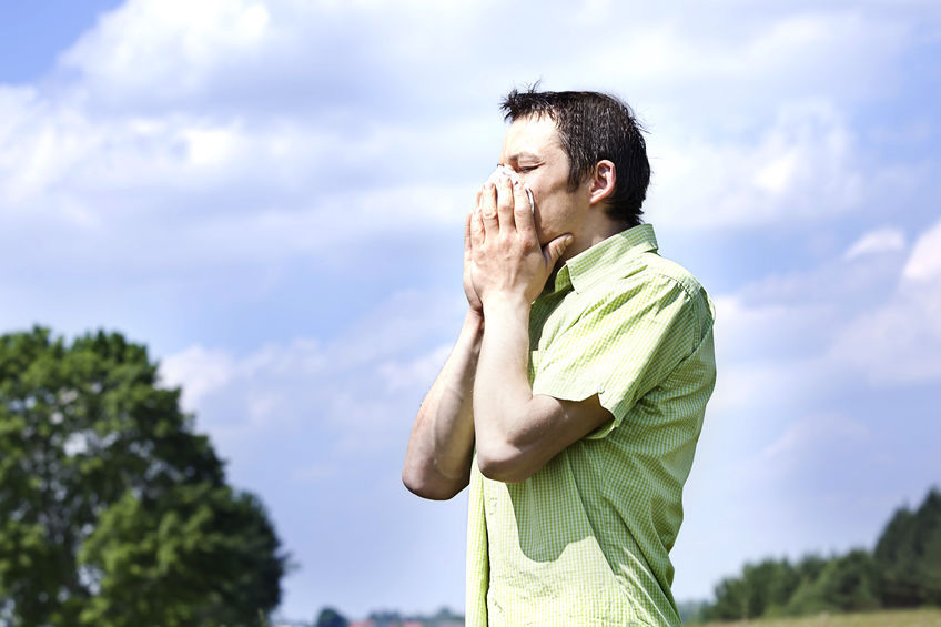 Male with seasonal allergies attack