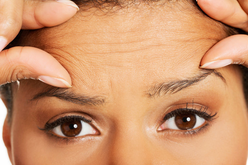 woman face, forehead wrinkles photo